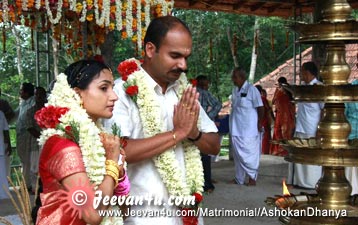 Ashokan Dhanya at Temple - wedding Photos